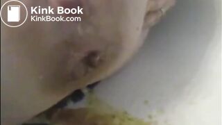 After enema woman shitting with power a lot in the bathtub
