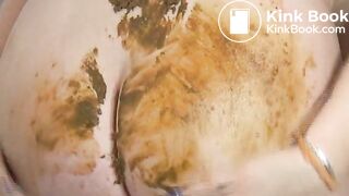 Nina smears her fresh shits