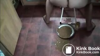 Wife shitting a lot of diarrhea in a white plate and pissing in a glass