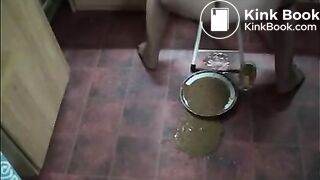 Wife shitting a lot of diarrhea in a white plate and pissing in a glass