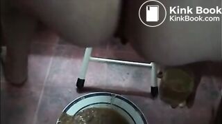 Wife shitting a lot of diarrhea in a white plate and pissing in a glass