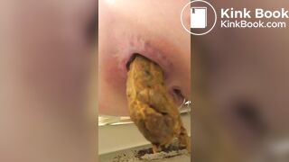 Girl shit and piss in a dirty toilet closeup