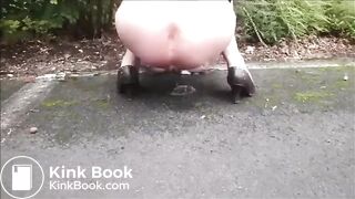 Older woman shit and piss on the road