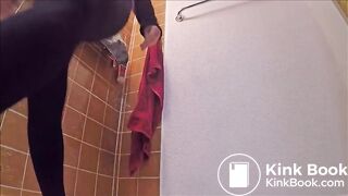 Girl in leggings shitting standing up on the floor