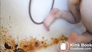Young girl shitting a very liquid diarrhea in the bathtub