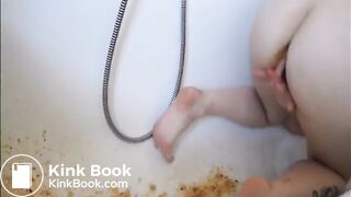 Young girl shitting a very liquid diarrhea in the bathtub