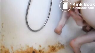 Young girl shitting a very liquid diarrhea in the bathtub