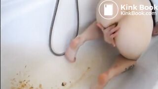 Young girl shitting a very liquid diarrhea in the bathtub