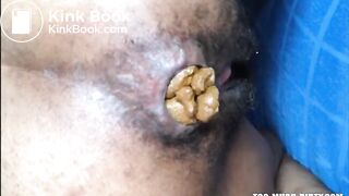 Hairy asshole latina shitting closeup