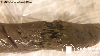 Tina pushes a big turd in the kitchen