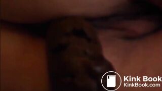Woman lying on bed and shitting