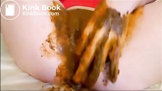 Babe masturbating with dildo while shitting