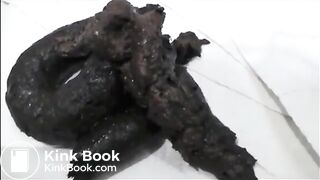 Sexy milf in lingerie and high heels shitting on the bathroom floor