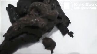 Sexy milf in lingerie and high heels shitting on the bathroom floor