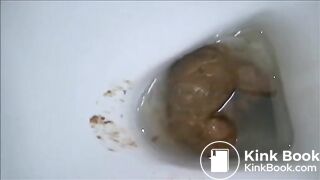 Babe open wide buttoks and shitting on the toilet