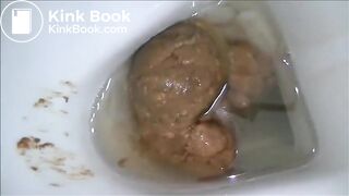 Babe open wide buttoks and shitting on the toilet
