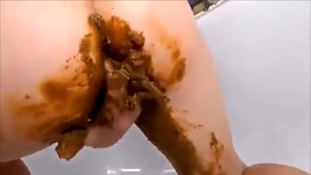 Girl shitting pissing and masturbating with dildo