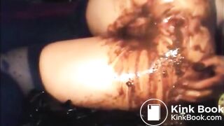 Girl shitting liquid and anal insertion