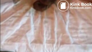 Shaved woman shitting on her bed