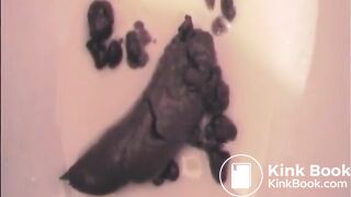 Big pussy lips woman shit and piss in the toilet