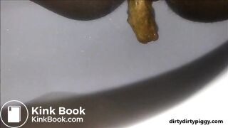 Ebony milf shitting closeup in the toilet