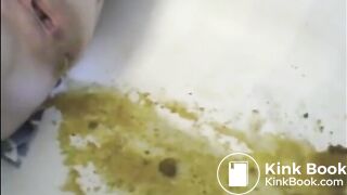 Woman shitting liquid after enema