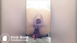 Slim girl shitting a large turd in the toilet