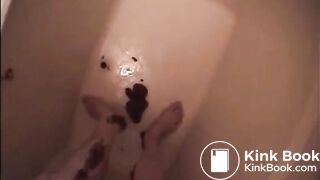 Asian milf shitting diarrhea on her legs satanding up