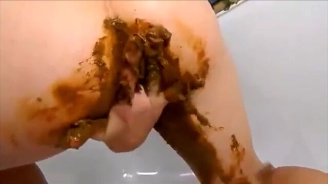 Girl smear shit on butt and cunt masturbating with dildo and fisting