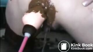 Mature woman anal fucked by sex machine shitting