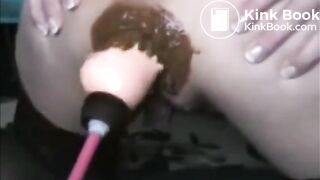 Mature woman anal fucked by sex machine shitting