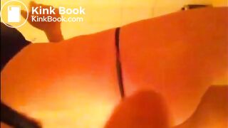 Brunette with tanga shitting on the floor