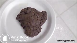 Brunette shitting in a white plate