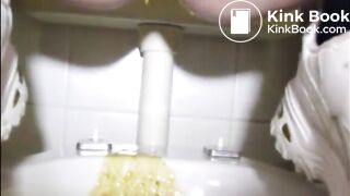 Girl is doing a big squirt of diarrhea
