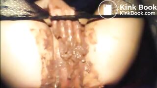 Woman shitting smearing and masturbating
