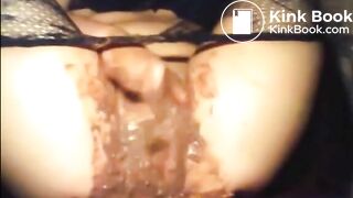 Woman shitting smearing and masturbating