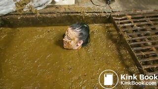 Betty completely submerges in cowshit