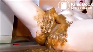 Woman masturbating with shit and dildo