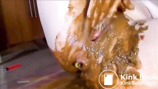 Woman masturbating with shit and dildo