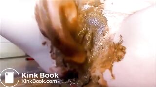 Woman masturbating with shit and dildo