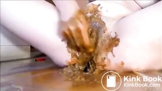 Woman masturbating with shit and dildo