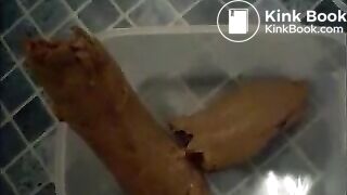 Mature bbw shitting in a plastic box