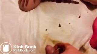 Masked girl smearing shit on her tits and face