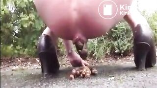 Mature woman shitting and pissing outdoor