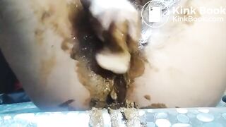 Ftm shits out a fat sloppy load then plays with it