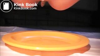 Woman shit and piss on a plate