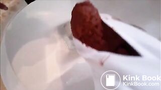 Babe is shitting a very big quantity of shit on white panty