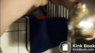 Big lady shitting in a jar and pissing