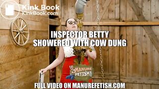 Inspector Betty showered with cowshit