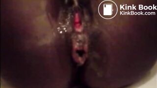 Black hairy woman shit and piss closeup